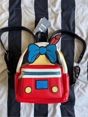Loungefly Pinocchio Disney mini backpack NWT